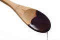 Melted dark chocolate on wooden spoon Royalty Free Stock Photo