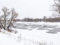 Melted ice on the spring river, winter landscape Royalty Free Stock Photo