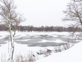 Melted ice on the spring river, winter landscape Royalty Free Stock Photo