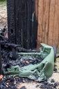 Melted plastic recycling wheelie bin after fire damage