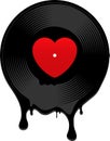 Melted vinyl record with heart Royalty Free Stock Photo