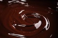 Melting chocolate, melted delicious chocolate for handmade praline icing confectionery Royalty Free Stock Photo