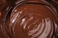 Melting chocolate, melted delicious chocolate for praline icing Royalty Free Stock Photo