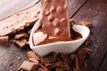 Melting chocolate, melted delicious chocolate for praline icing Royalty Free Stock Photo