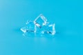 Melting ice on a blue background, meltwater from ice Royalty Free Stock Photo