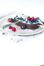 Melting ice cream with fresh berries. Royalty Free Stock Photo