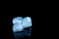 Melting ice cubes on black background Royalty Free Stock Photo