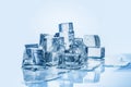 Melting ice cubes on blue background Royalty Free Stock Photo