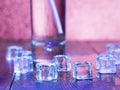 Melting ice cubes on a wooden table. Close-up Royalty Free Stock Photo