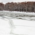 Melting ice on frozen river Royalty Free Stock Photo