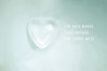 Melting ice heart on a glass surface (Love motto) Royalty Free Stock Photo