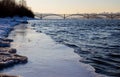 Melting ice on the river in spring. Ice drift time. Natural structure. Needles in the sun