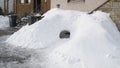 Melting ice from a snow cave igloo on a sunny day in late winter early spring near Neuhof, Germany. Royalty Free Stock Photo