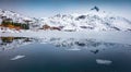 Melting ice on Vatterfjordpollen fjord. Misty spring view of Lofoten Islands, Svolvaer town location, Norway, Royalty Free Stock Photo