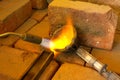 Melting metal in a jewelry workshopMetal melting