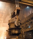 Melting of metal in a steel plant. High temperature in the melting furnace. Metallurgical industry.