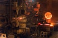 Melting of metal in a steel plant. High temperature in the melting furnace. Metallurgical industry. Factory for the