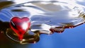 A melting red heart disintegrating into mush. Heart as a symbol of affection and love