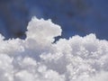 Melting snow in early spring in March. Sunny bright day. The beginning of the warm season, the end of winter. Snowdrift close-up. Royalty Free Stock Photo