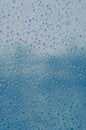 Melting snow on the glass, drops of water condensation on the window, and transparent glass of the window in cold winter, winter Royalty Free Stock Photo