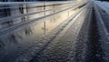 Melting Snow and Ice on a Wet Road Royalty Free Stock Photo