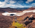 Melting snow onthe shore of Krafla Viti Crater lake.