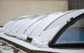 Melting snow on the pool roof going down Royalty Free Stock Photo