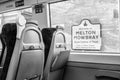 MELTON MOWBRAY, ENGLAND- 3 April 2021: Black and white photo of a welcome to MELTON MOWBRAY sign viewed from crosscountry train