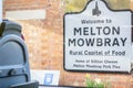 MELTON MOWBRAY, ENGLAND- 3 April 2021: Welcome to MELTON MOWBRAY sign viewed from the inside of a train