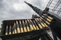 Member of the mobile air defence group checks M2 Browning machine gun atop of a pick up truck in Hostomel town, Ukraine Royalty Free Stock Photo