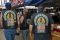 Members of the American Veterans Motorcycle Club walking on a street of the city of Sturgis, during the annual Sturgis Motorcycle