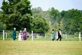 Members of an Amish community walk to a funeral