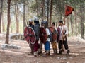Members of the annual reconstruction of the life of the Vikings - `Viking Village` demonstrate combat formation in the forest near