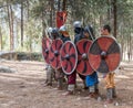 Members of the annual reconstruction of the life of the Vikings - `Viking Village` demonstrate combat formation in the forest near