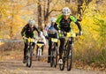 Members of bicycle race competition passing last kilometers in race