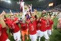 Members of CFR Cluj soccer team celebrate winning the Supercup