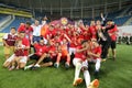 Members of CFR Cluj soccer team celebrate winning the Supercup