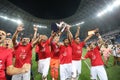 Members of CFR Cluj soccer team celebrate winning the Supercup
