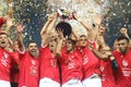 Members of CFR Cluj soccer team celebrate winning the Supercup