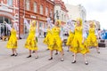 Members of dance groups in national costumes at the festive procession of graduates of schools