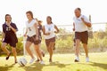 Members Of Female High School Soccer Playing Match Royalty Free Stock Photo