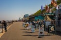 Members of the general public outside the Reef Stop cafÃÂ© on CromerÃ¢â¬â¢s sea front enjoying light refreshments and the glorious