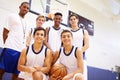 Members Of Male High School Basketball Team With Coach Royalty Free Stock Photo