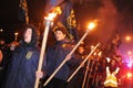 Members of the nationalist organizations hold torches as they take part in a rally marking the 70th death anniversary of Roman Shu