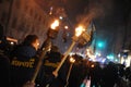 Members of the nationalist organizations hold torches as they take part in a rally marking the 70th death anniversary of Roman Shu