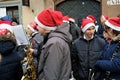 Members of a school orchestra wearing Santa Claus hats waiting to perform at `Orszak Swietego Mikolaja` Saint Nicholas Processi Royalty Free Stock Photo