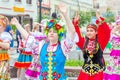 Members of theater groups in national costumes at the festive procession of graduates of schools