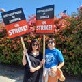 Members of the Writers Guild of America picket CBS in Hollywood