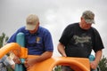 Rotary members from the community helping to build a playground for children.