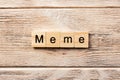 Meme word written on wood block. meme text on table, concept Royalty Free Stock Photo